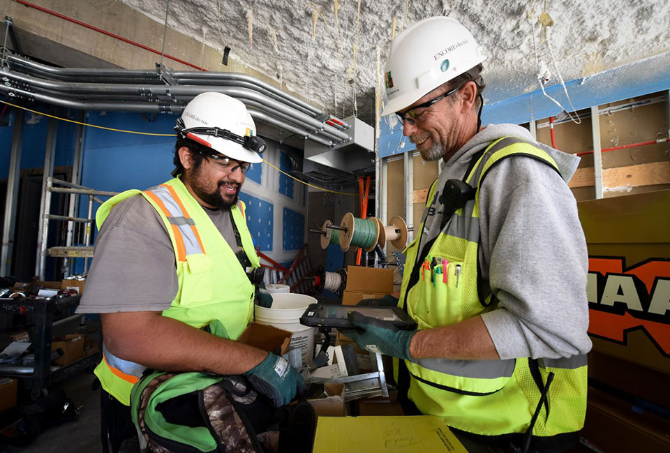 Apprenticeship program showing two apprentices working.